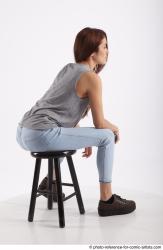 MOLLY SITTING POSE WITH GUN 2